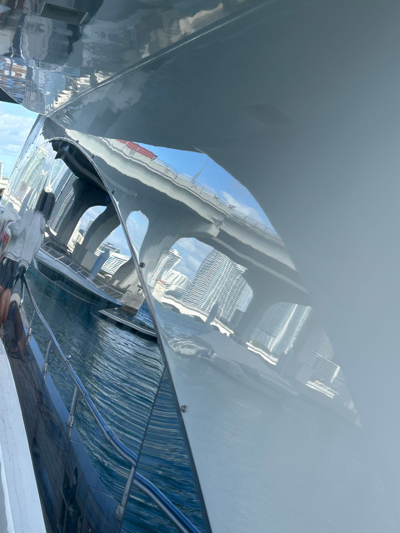 Mirror bow reflection of downtown Miami skyline after paint correction
