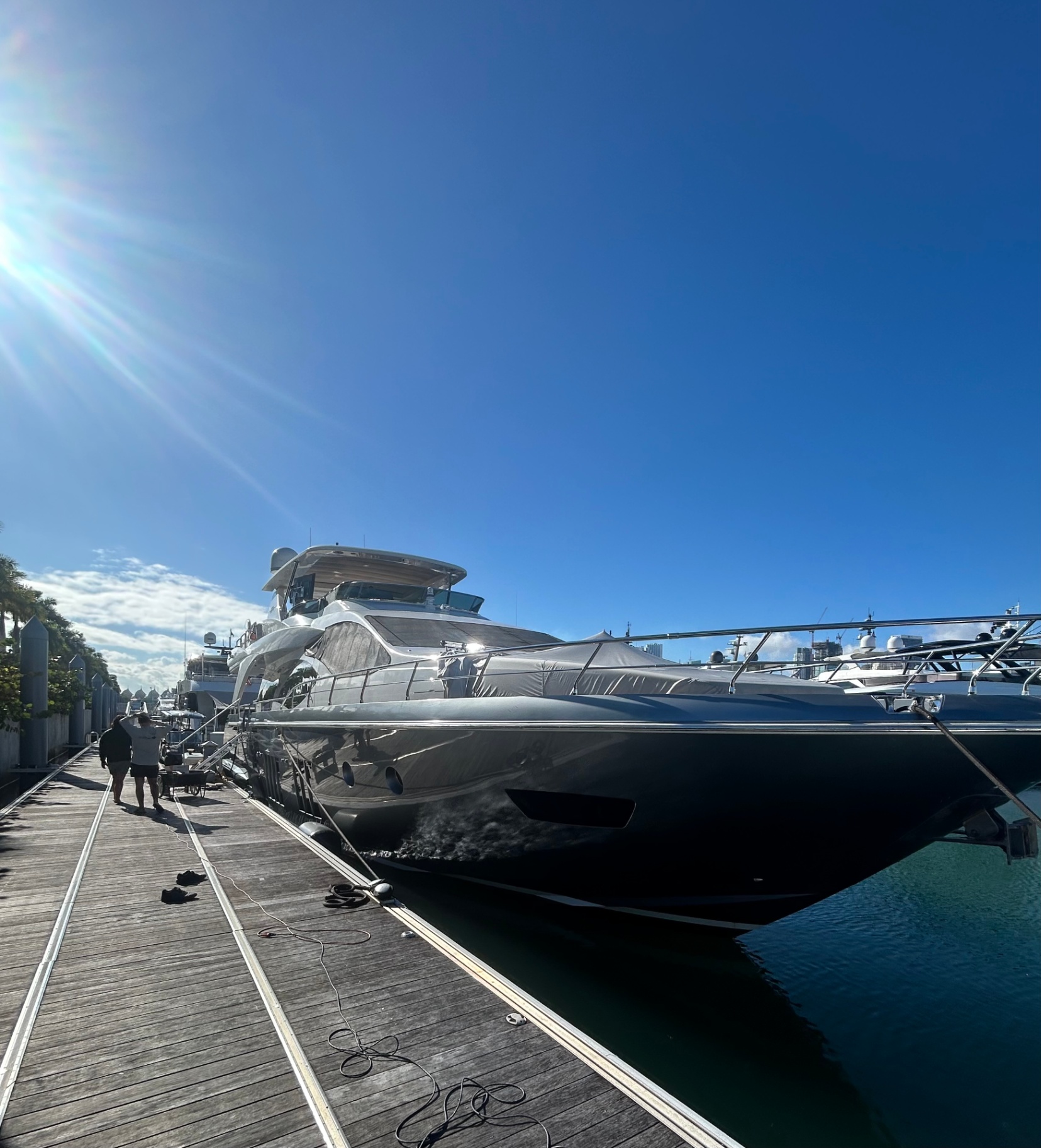 Azimut motor yacht detailed and gleaming under South Florida sun